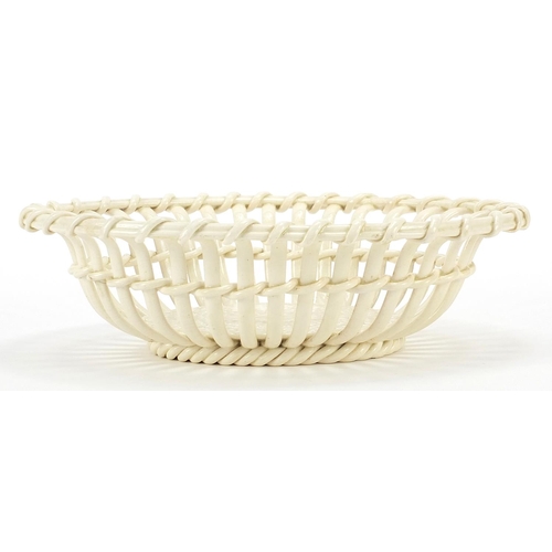 74 - Wedgwood, 19th century Creamware basket, impressed marks to the base, 24cm wide
