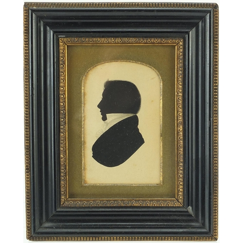 119 - Two 19th century hand painted silhouette portraits of gentlemen, each framed, the largest 9cm x 5.5c... 