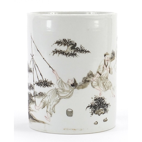 56 - Chinese porcelain en grisaille brush pot hand painted with figures in a landscape, 13.5cm high