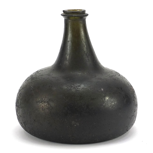 41 - 17th/18th century green glass onion bottle, 14.5cm high