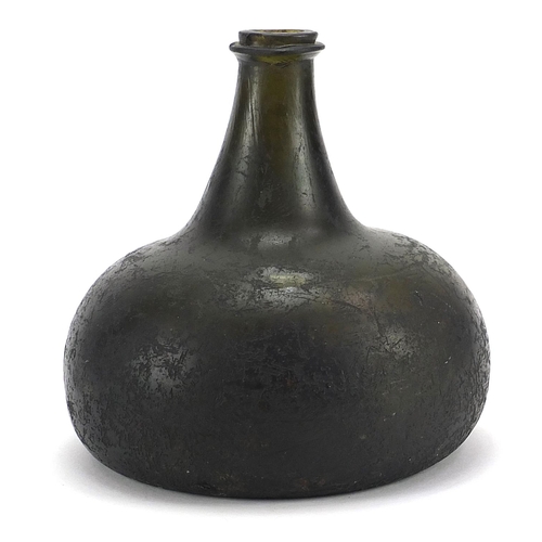 41 - 17th/18th century green glass onion bottle, 14.5cm high