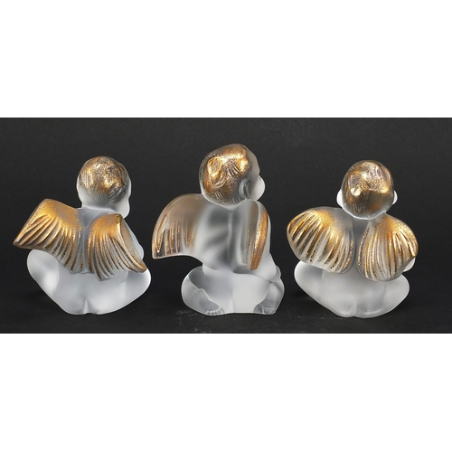 245 - Three frosted and gilt glass angels etched Lalique France, each 8.5cm high