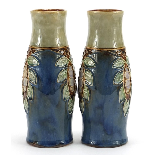 229 - Pair of Royal Doulton stoneware vases hand painted with stylised fruit and flowers, each numbered 18... 