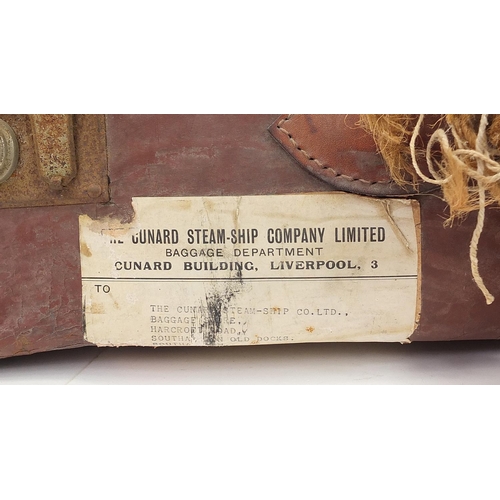 1154 - Two vintage brown leather suitcases with Cunard White Line shipping labels, the largest 71cm wide