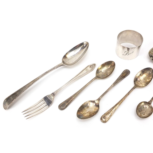 2246 - Georgian and later silver spoons and a fork, circular silver napkin ring and a silver plated combina... 