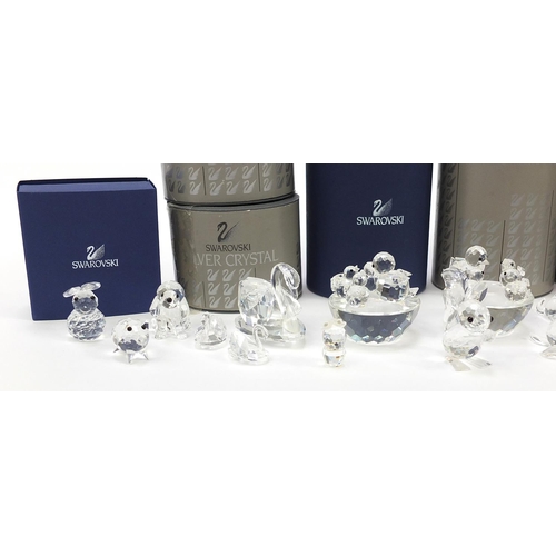 551 - Collection of Swarovski Crystal animals, flowers and candleholders, some with boxes, the largest 10c... 