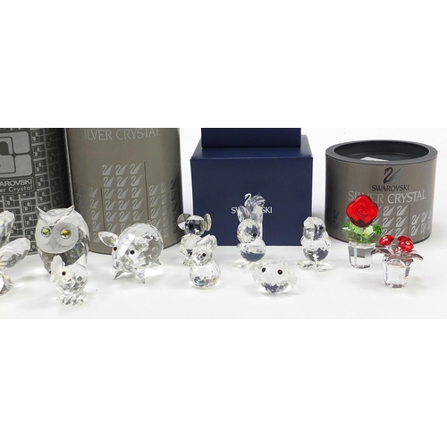 551 - Collection of Swarovski Crystal animals, flowers and candleholders, some with boxes, the largest 10c... 