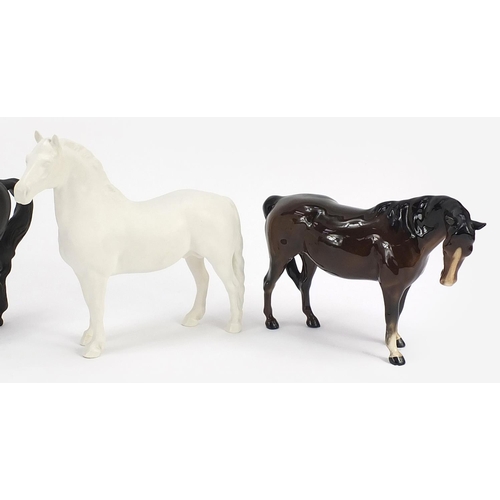 523 - Five Beswick horses including Black Beauty, the largest 24.5cm in length