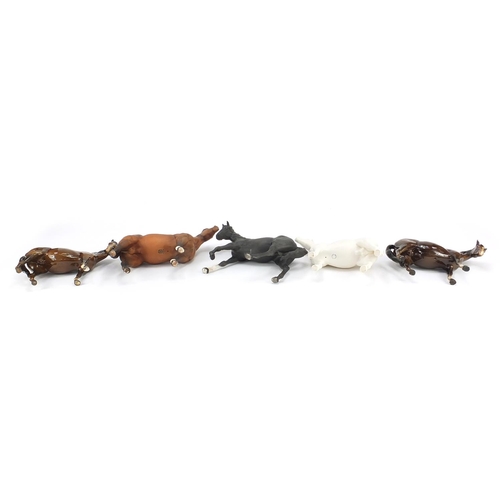 523 - Five Beswick horses including Black Beauty, the largest 24.5cm in length