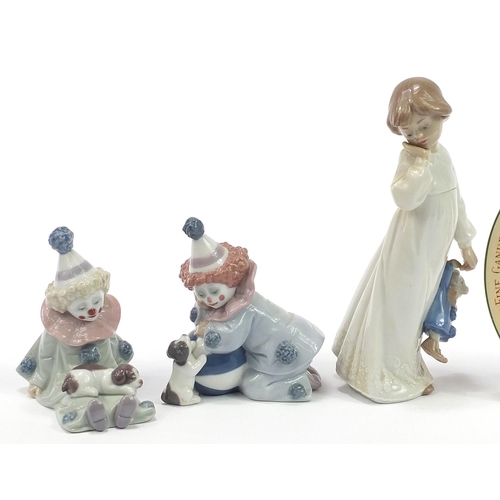 575 - Collectable china comprising two Lladro clowns, Nao Bedtime figurine, Silly Nursery Rhyme cup and Cr... 