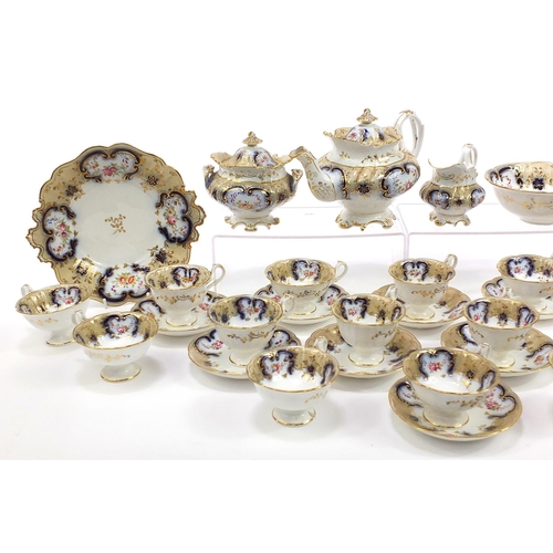 559 - Victorian porcelain teaware hand painted and gilded with flowers, pattern no 4126, including teapot,... 