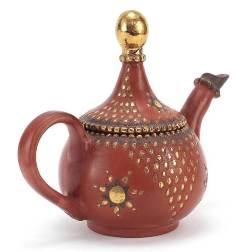 172 - Turkish Tophane terracotta coffee pot with gilt decoration, 18.5cm high