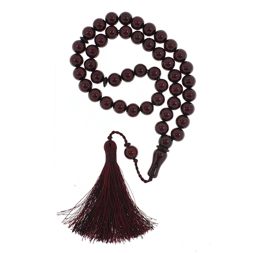 1281 - Cherry amber coloured Tesbih prayer beads, 47cm in length