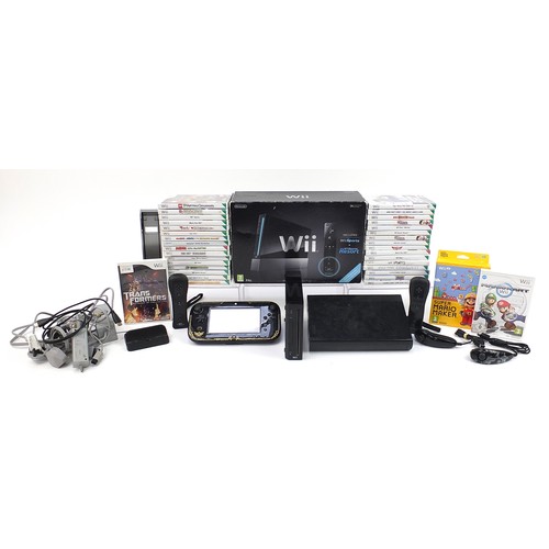 1521 - Nintendo Wii games console and Nintendo Wii U games console with a collection of games and accessori... 