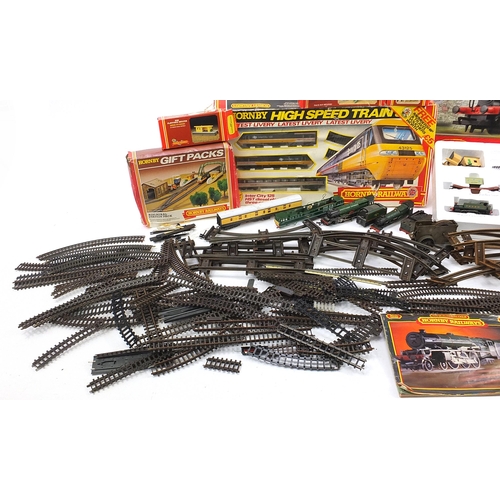 1059 - Model railway train sets, track and accessories including Tri-ang locomotive and Hornby