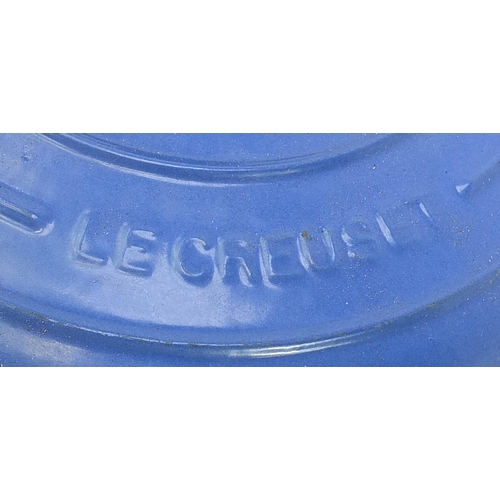 1022 - Group of vintage Le Creuset cast iron and stoneware pans and saucepans, the largest 37cm wide