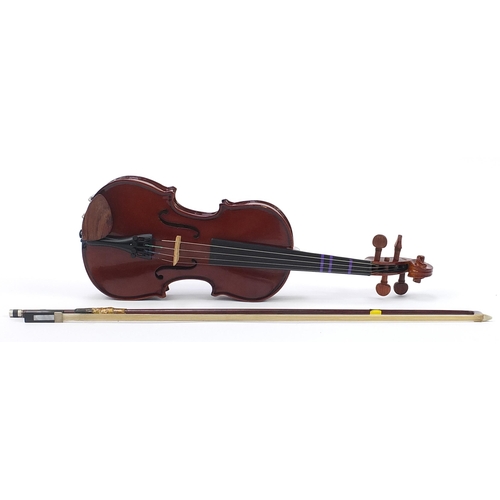 1062 - Stentor Student 1 child's violin with bow and protective case, the violin back 25cm in length