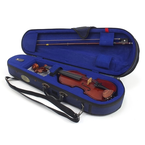 1062 - Stentor Student 1 child's violin with bow and protective case, the violin back 25cm in length