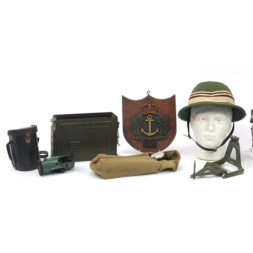 1571 - Militaria including ammunition tins, tropical pith helmet and naval plaque