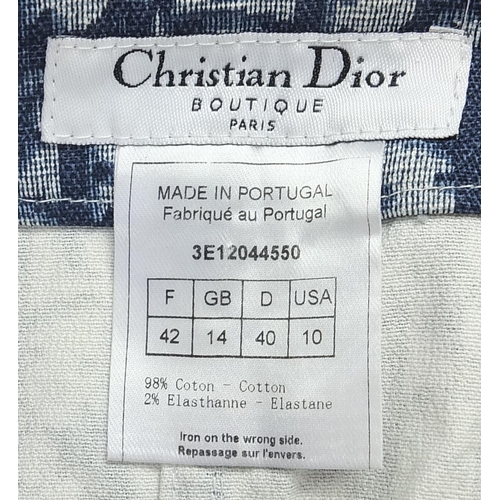 923 - Pair of vintage Christian Dior monogrammed jeans, size 14