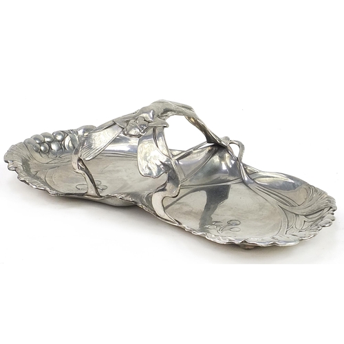 233 - WMF, German Art Nouveau pewter swing meat dish with handle in the form of a nude female, 31cm wide