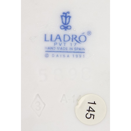 511 - Lladro figurine of a female in a flowing dress, numbered 5898