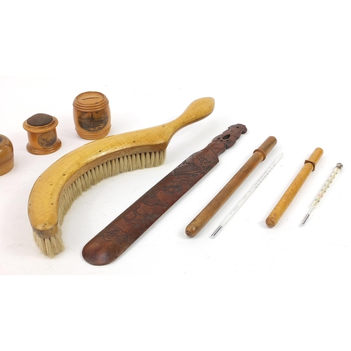 660 - Treen objects including a hat brush, Chinese page turner, Sorento box with glass liner and Mauchline... 