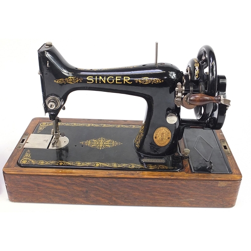 1037 - Two Victorian sewing machines comprising Willcox & Gibbs and Singer, the largest 44cm in length