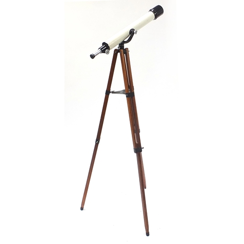 1053 - Unnamed telescope mounted on a military style adjustable tripod stand