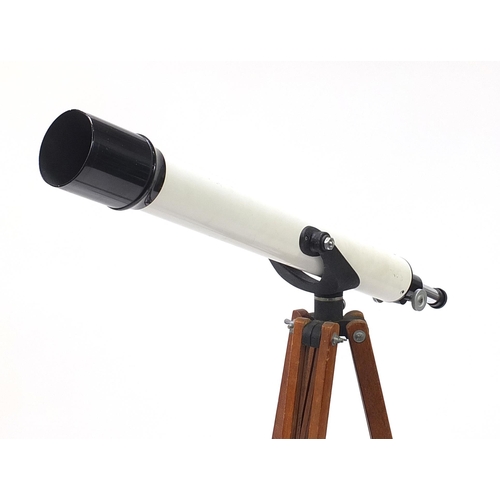 1053 - Unnamed telescope mounted on a military style adjustable tripod stand