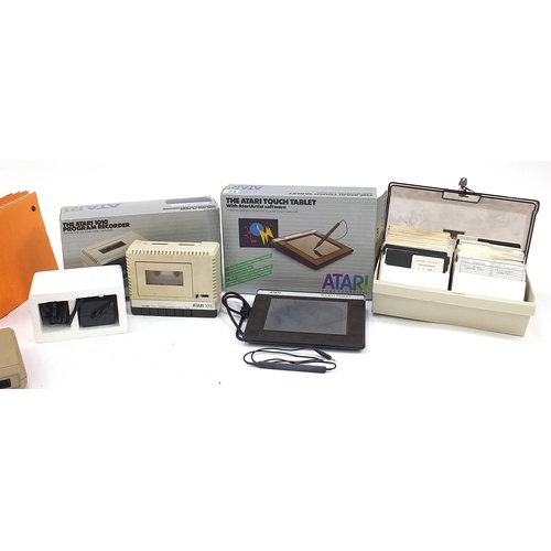 1495 - Atari computer accessories, discs and manuals including 1010 programme recorder and touch tablet