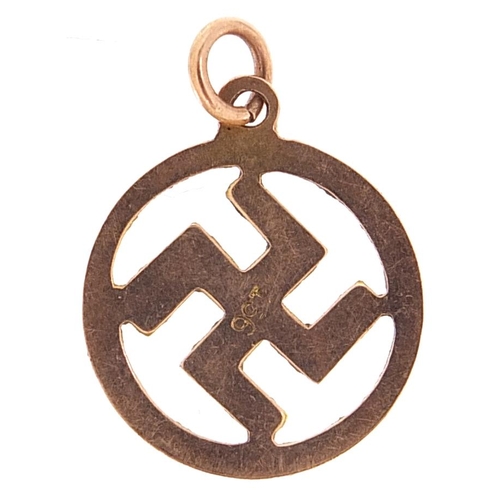 2151 - 9ct gold swastika charm, 1.8cm high, 0.7g