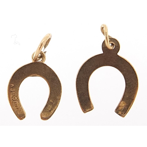 2139 - Two 9ct gold horseshoe charms, the largest 1.4cm high, 0.7g