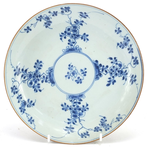 399 - Chinese blue and white porcelain shallow dish hand painted with flowers, 22cm in diameter