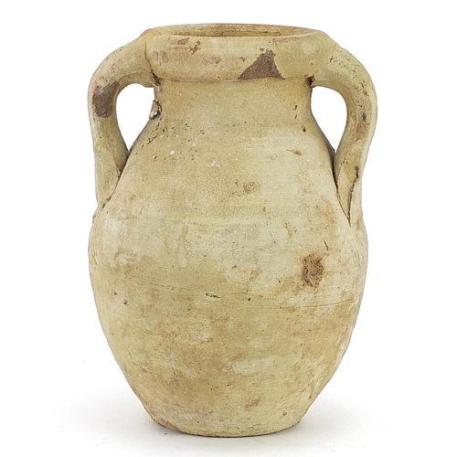 740 - Egyptian style pottery vessel with twin handles, 15cm high