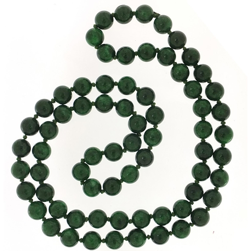 705 - Malachite polished bead necklace, 82cm in length