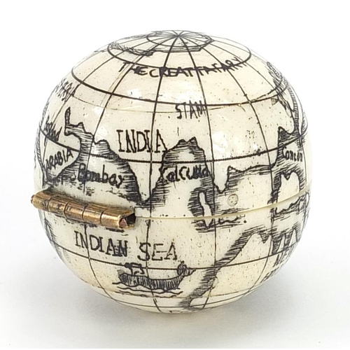 417 - Sailor's style carved bone pocket globe compass, 4cm in diameter