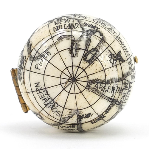 417 - Sailor's style carved bone pocket globe compass, 4cm in diameter