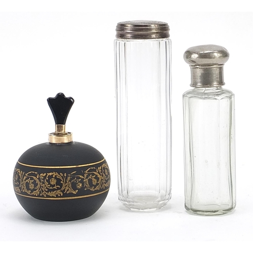 485 - Globular black glass scent bottle with 9ct gold mounts and two clear glass scent bottles, one with s... 