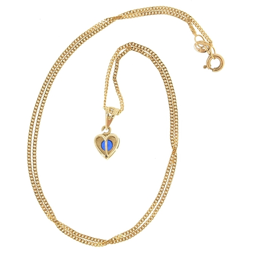 1724 - 9ct gold necklace with a yellow metal love heart pendant set with a blue stone, 1.4cm high and 42cm ... 