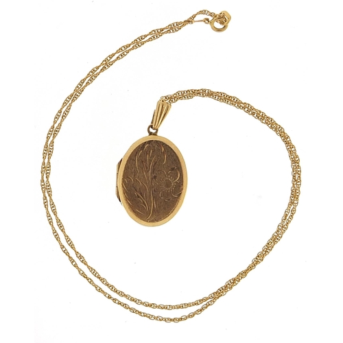 1864 - 9ct gold oval locket with engraved decoration on a 9ct gold rope twist necklace, 3.1cm high and 42cm... 