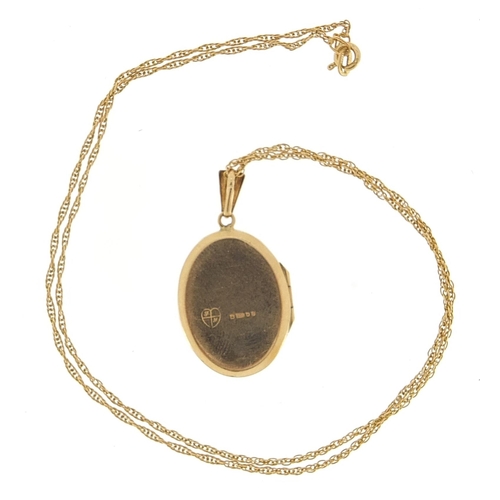 1864 - 9ct gold oval locket with engraved decoration on a 9ct gold rope twist necklace, 3.1cm high and 42cm... 