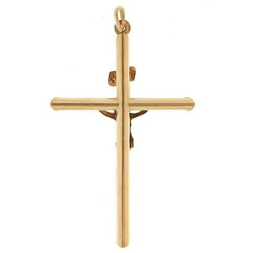 1669 - 9ct gold crucifix pendant, 5.1cm high, 2.4g