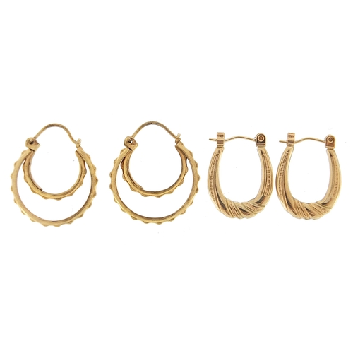 2083 - Two pairs of yellow metal hoop earrings, the largest 1.7cm in diameter, 2.0g