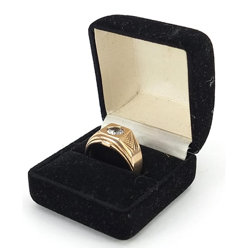 1708 - 9ct gold clear stone solitaire ring with engraved shoulders, size T, 6.2g