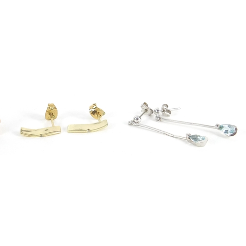 2040 - Four pairs of 9ct gold and yellow metal earrings including a pair of teddy bear stud earrings, the l... 