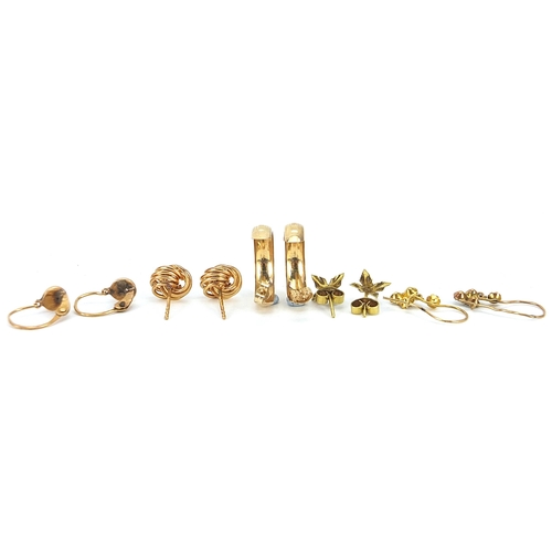 1771 - Five pairs of 9ct and yellow metal earrings including a pair of 9ct gold knot stud earrings, the lar... 