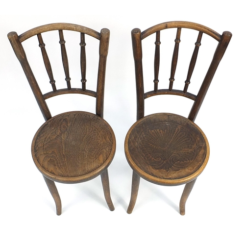 911 - Pair of Thonet bentwood bistro chairs, each 89cm high