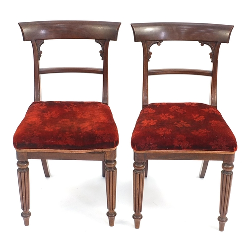 912 - Pair of Victorian mahogany dining chairs with red upholstered stuffover seats, 87cm high