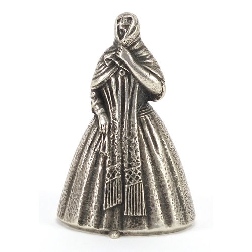 2263 - Peruvian sterling silver table bell in the form of a female in a dress, impressed A Mano, 7.5cm high... 